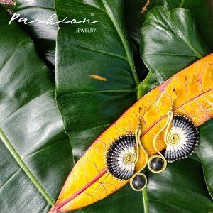 Handmade earrings by artisans from Chiang Mai